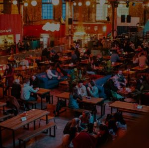 A buzzing food hall at Escape to Freight Island in Manchester.