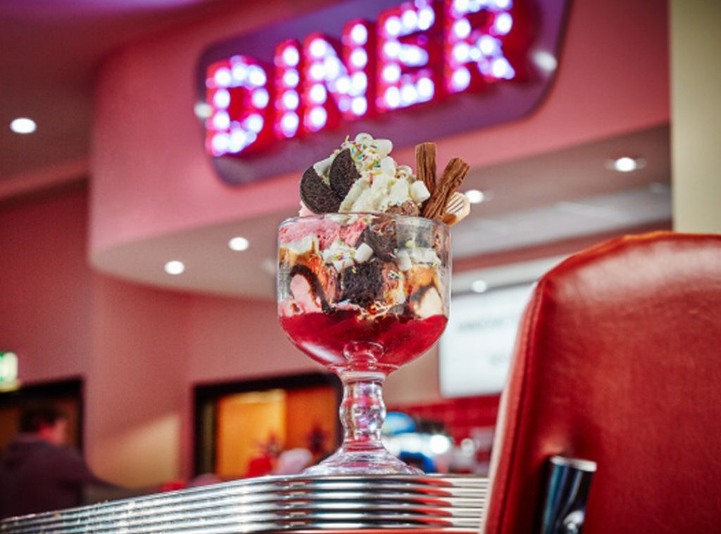 Colourful sundae dessert in American diner