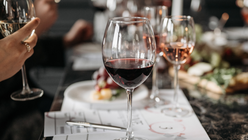A cheese and wine pairing event in a restaurant tapping into experience le dining trends.